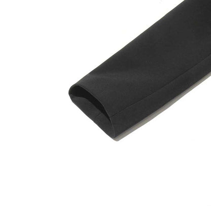 Elegant women's maxi blazer coat sleeve detail showcasing sleek design and high-quality fabric