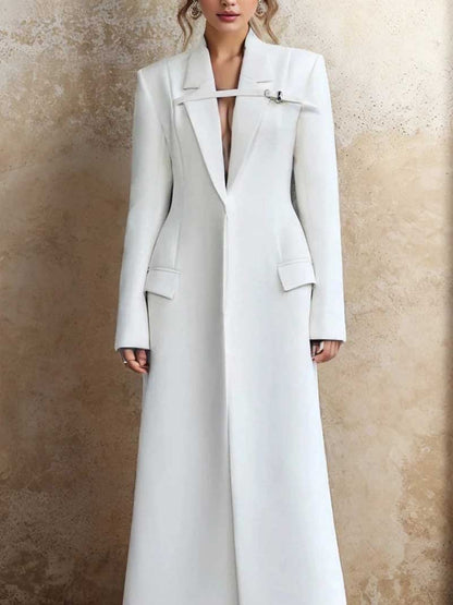 Elegant women's maxi blazer coat in white with a sleek design and unique closure for modern style