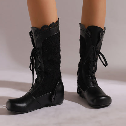 Women's mid-calf lace up wedge boots with decorative lace detailing and a sleek design