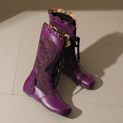 Stylish women's mid-calf lace up wedge boots in purple with decorative details and laces