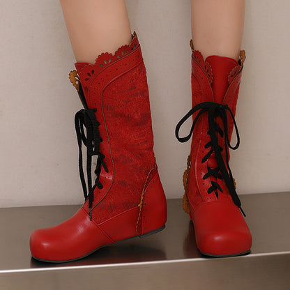 Red women's mid-calf lace up wedge boots with decorative lace and sturdy wedge heels