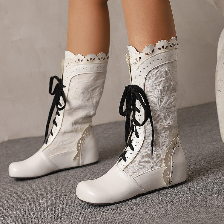 Women's mid-calf lace up wedge boots in white with decorative detailing and stylish lacing