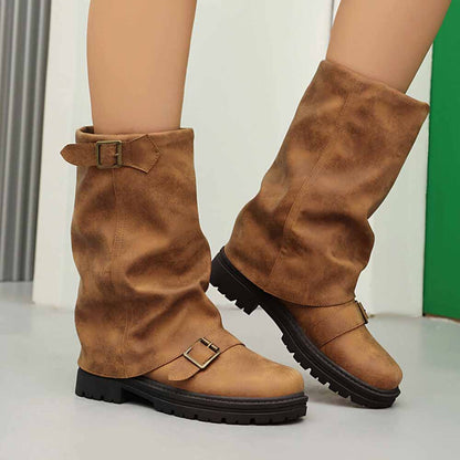 Stylish brown women's mid-calf low heel boots with adjustable buckles and a rugged sole