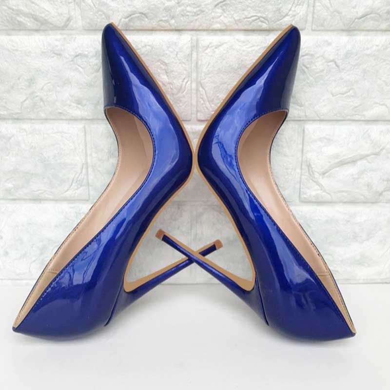 Women's navy high heel pumps with sleek design and glossy finish for elegant occasions
