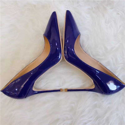 Stylish women's navy high heel pumps with a sleek pointed toe design for elegant occasions