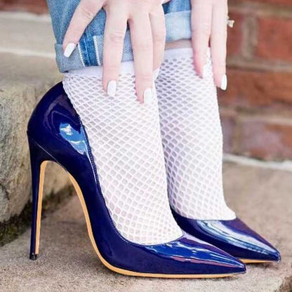 Stylish women's navy high heel pumps paired with fishnet stockings for a trendy look