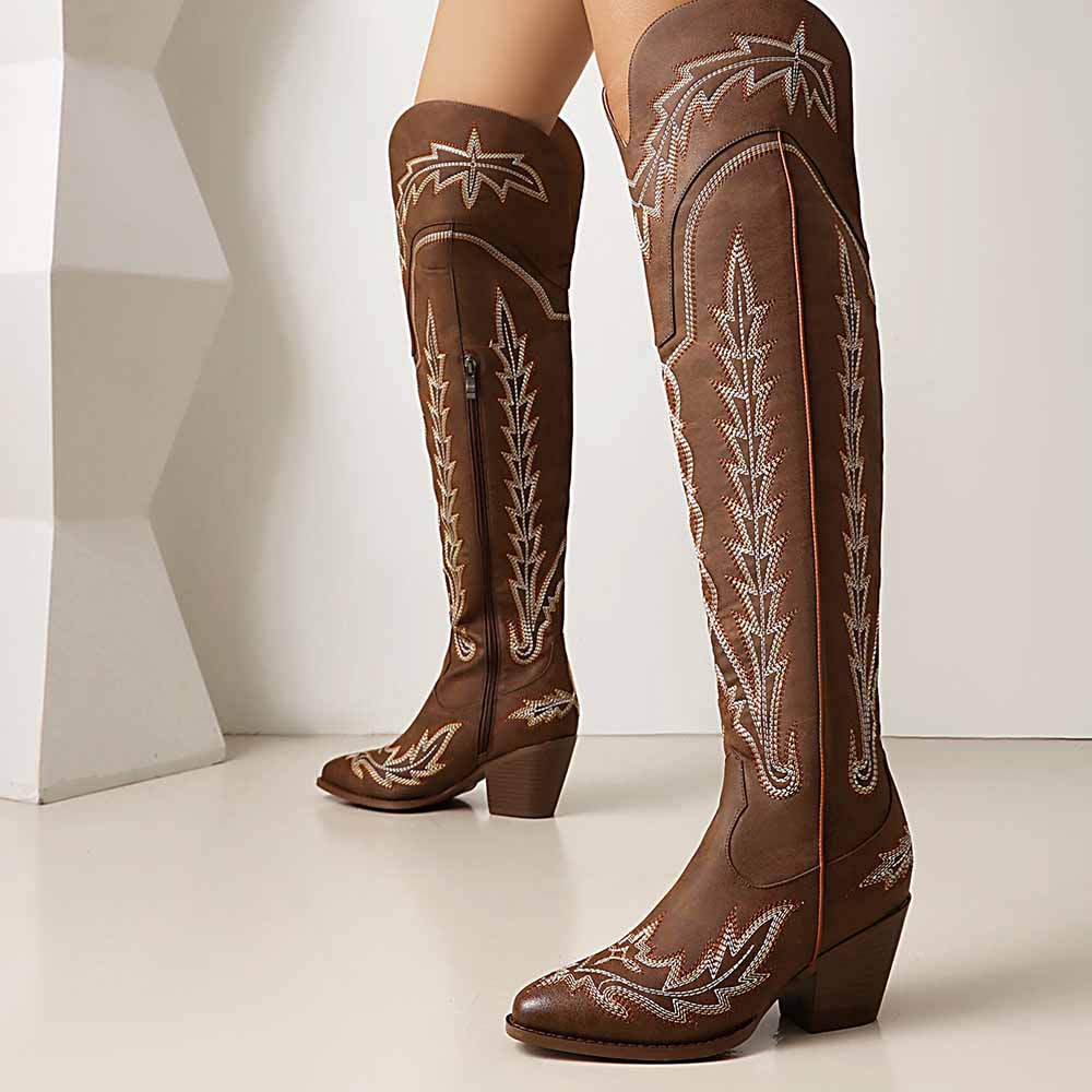 Stylish women's over the knee cowboy boots in brown with intricate stitching design and block heel
