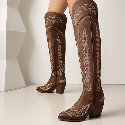 Stylish women's over the knee cowboy boots in brown with intricate stitching design and block heel