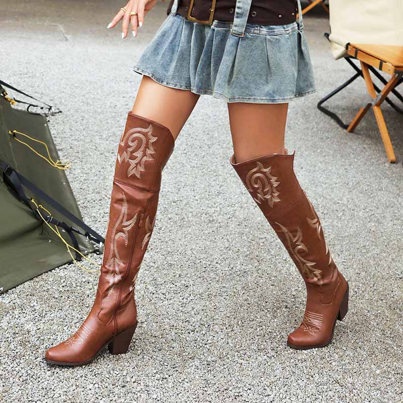 Brown women's over the knee cowboy boots featuring intricate embroidery for a stylish look