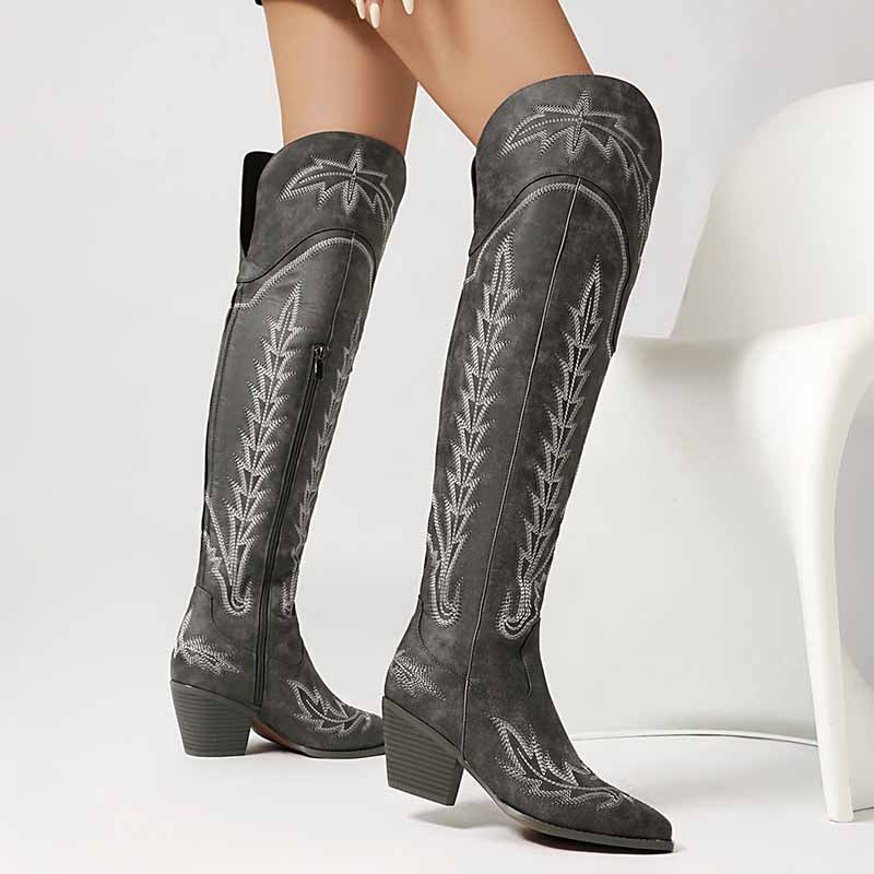 Stylish women's over the knee cowboy boots in gray with detailed embroidery and a stacked heel