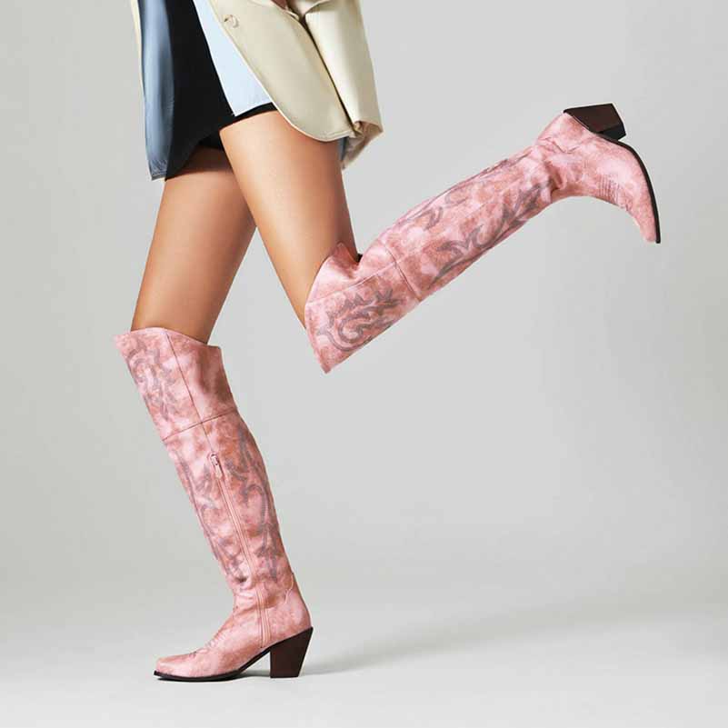 Stylish women's over the knee cowboy boots in pink with a pointed toe and block heel