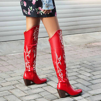 Stylish red women's over the knee cowboy boots with decorative stitching for trendy outfits