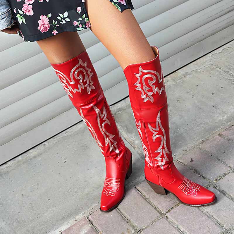 Stylish women's over the knee cowboy boots in red with intricate stitching and a classic western design