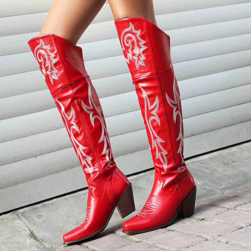 Stylish red women's over the knee cowboy boots with decorative stitching and a chunky heel