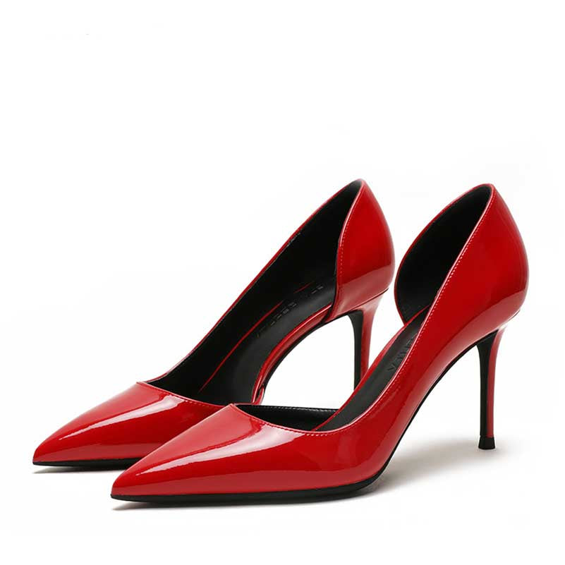 Stylish red women's patent leather party heels with a sleek pointed toe and high stiletto design