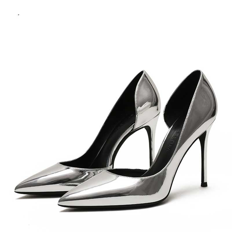Women's patent leather party heels in sleek silver design with pointed toe and high stiletto heel