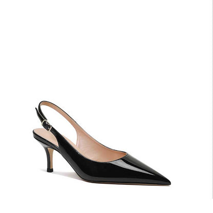 Women's patent leather slingback heels with a pointed toe and slim heel design