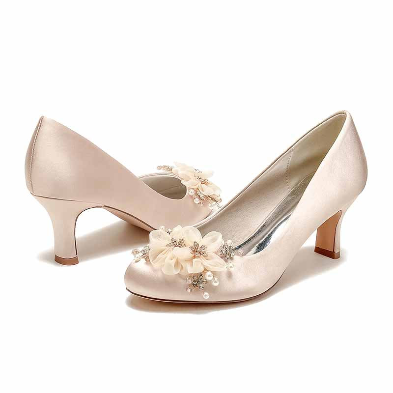 Women's pearl rhinestone wedding shoes with floral embellishments and mid-heel design