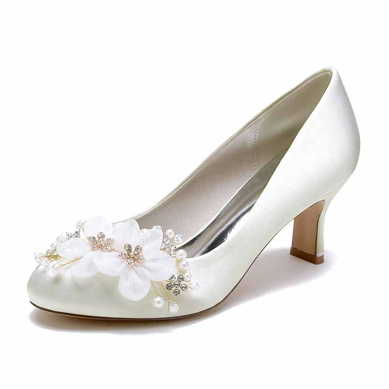 Elegant women's pearl rhinestone wedding shoes with floral embellishments and a low heel