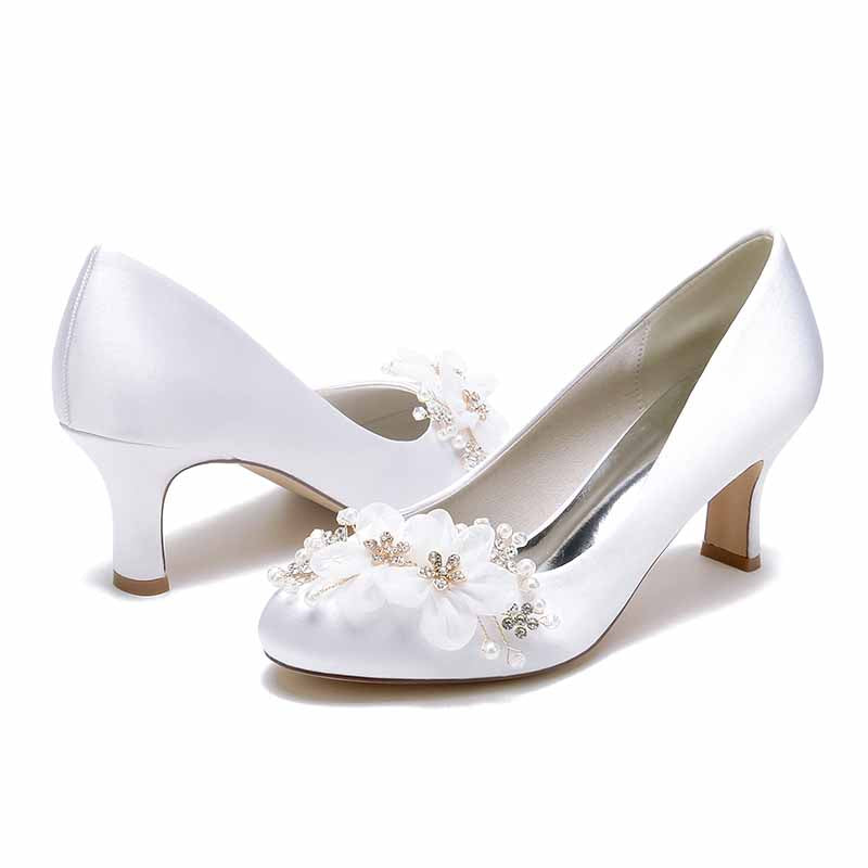 Elegant women's pearl rhinestone wedding shoes featuring floral embellishments and a comfortable heel