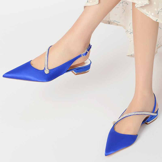 Women's pointed toe party flats in blue satin with elegant embellishments and a slingback design