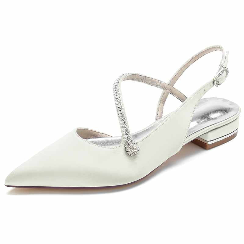 Women's pointed toe party flats in white with elegant strap and subtle embellishments