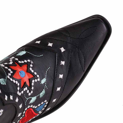 Women's retro floral cowboy boots in black with colorful floral embroidery detailing