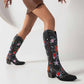 Stylish women's retro floral cowboy boots featuring vibrant floral embroidery and a sleek design