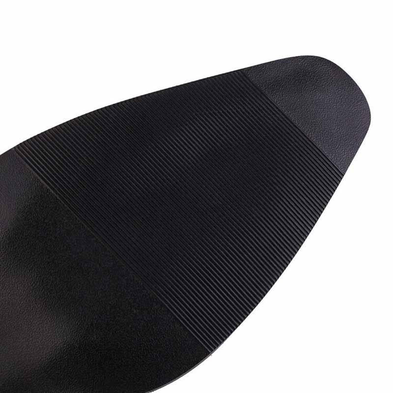 Women's retro floral cowboy boots featuring a stylish black sole with textured grip