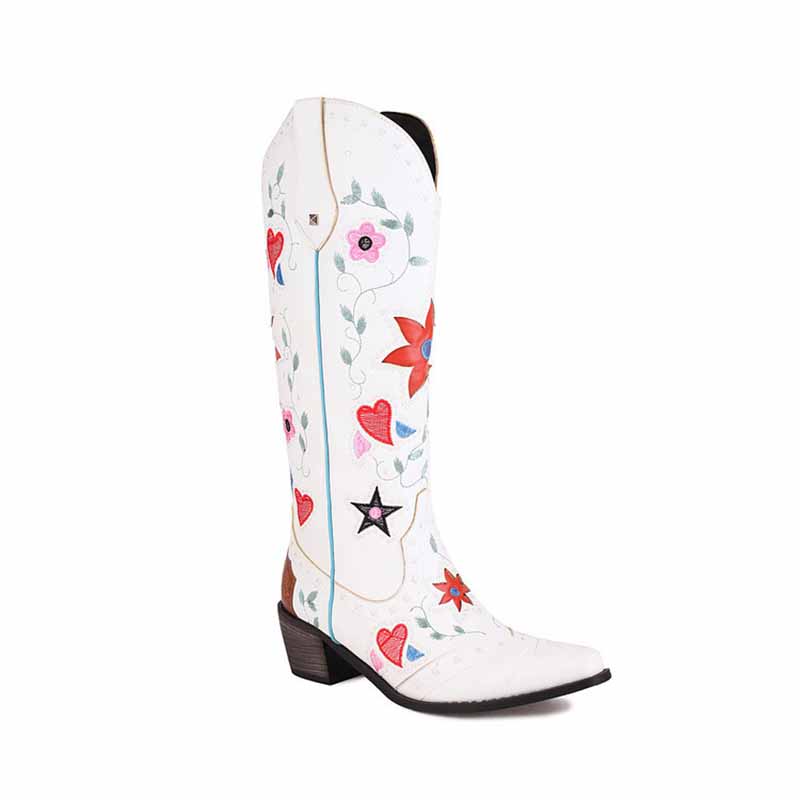 White women's retro floral cowboy boots featuring colorful floral and heart designs