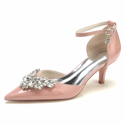 Pink women's rhinestone bridal heels with ankle strap and embellished toe for a stylish wedding look