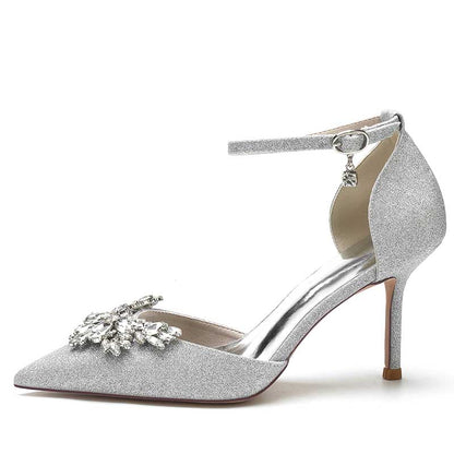 Stylish women's rhinestone wedding pumps with a pointed toe and ankle strap design in silver
