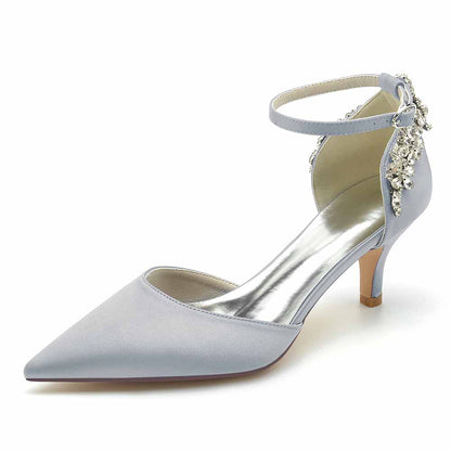 Light blue women's satin bridal heels with ankle strap and decorative embellishments for weddings