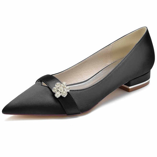 Elegant black women's satin flats for weddings featuring a chic floral embellishment