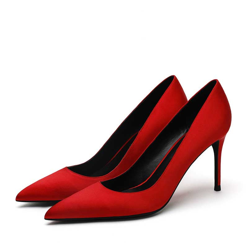 Elegant red women's satin party shoes with a sleek pointed toe and high stiletto heel
