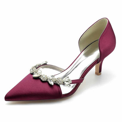Women's satin pointed toe pumps with decorative embellishments for elegant wedding style