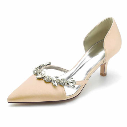 Women's satin pointed toe pumps with decorative crystal embellishments for elegant bridal styling