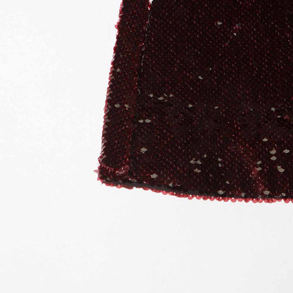 Close-up of sd-hk women's sequin blazer showcasing shimmering fabric details and vibrant color