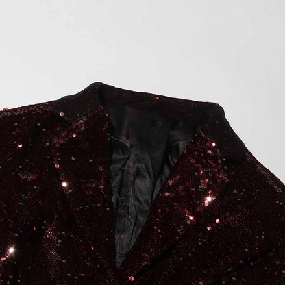 Elegant burgundy women's sequin blazer with a sleek collar and shiny sequins for festive occasions