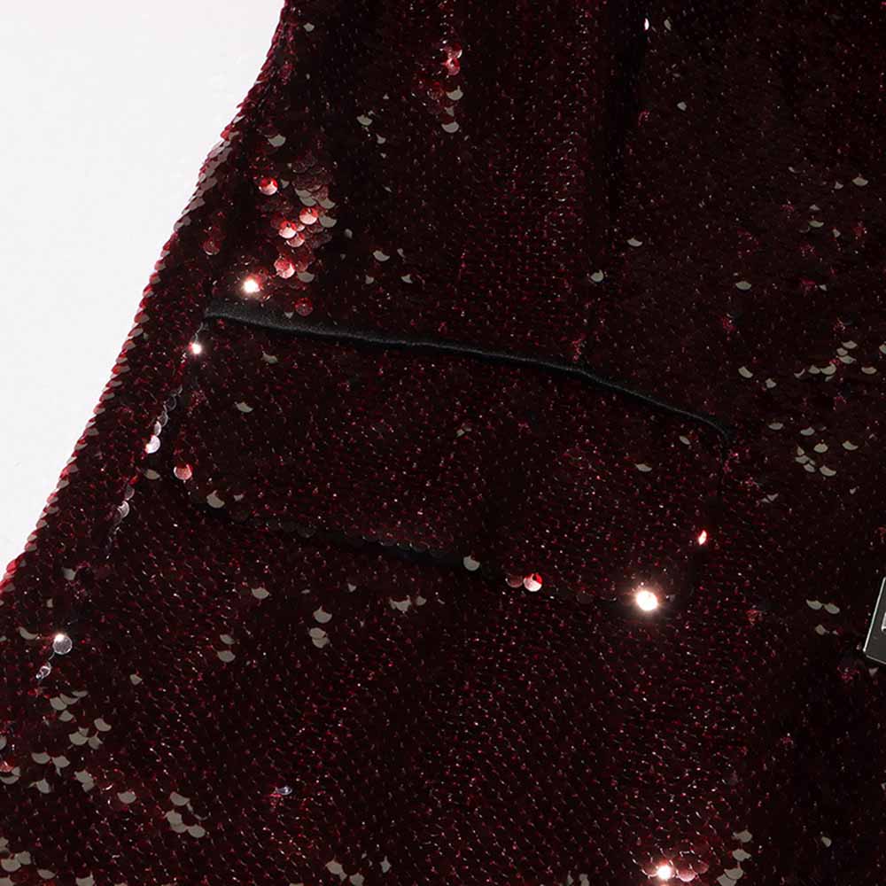 Close-up of sd-hk women's sequin blazer in burgundy with shiny sequins and a chest pocket