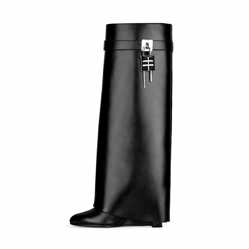 Elegant women's shark lock knee high boots in black with a modern design and secure buckle detail