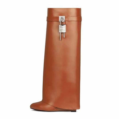Stylish women's shark lock knee high boots in tan with a sleek design and fashionable details