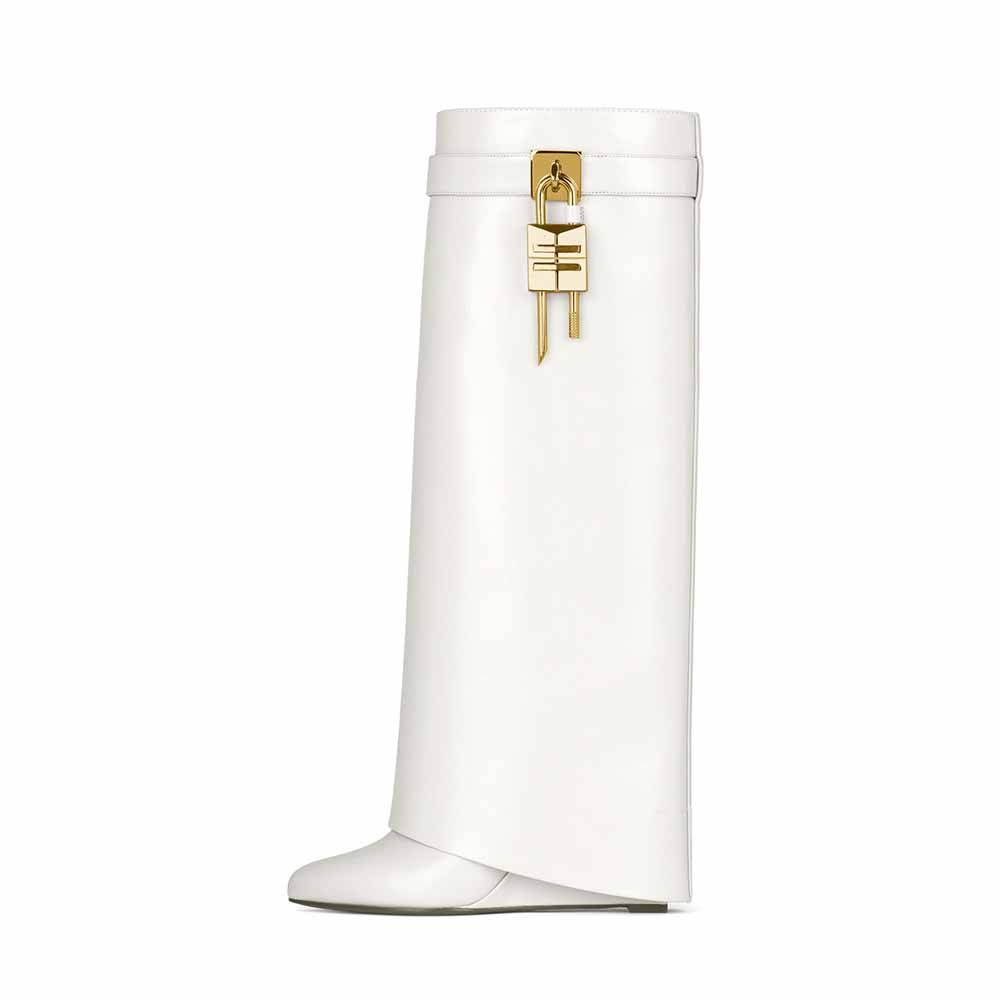 Stylish women's shark lock knee high boots in white with unique design detail and sleek silhouette