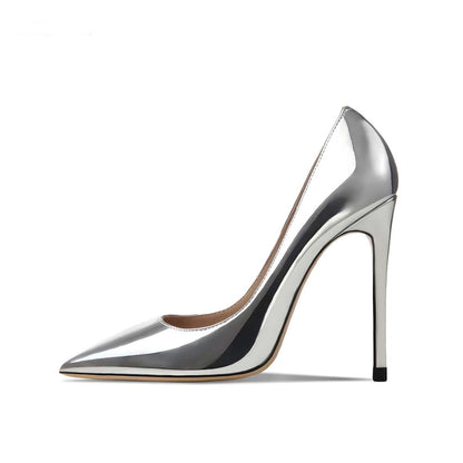 Elegant women's silver patent heels with a sleek pointed toe and high stiletto heel