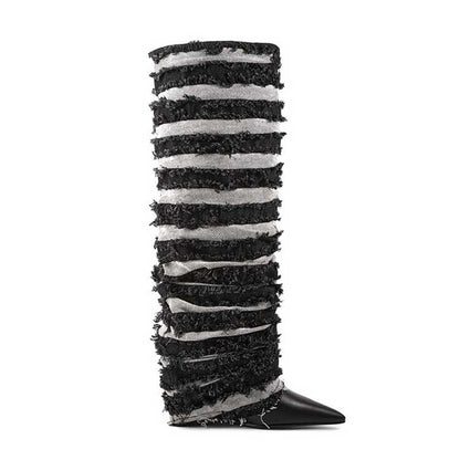 Stylish women's statement denim boots with a unique striped design and pointed toe for a bold look