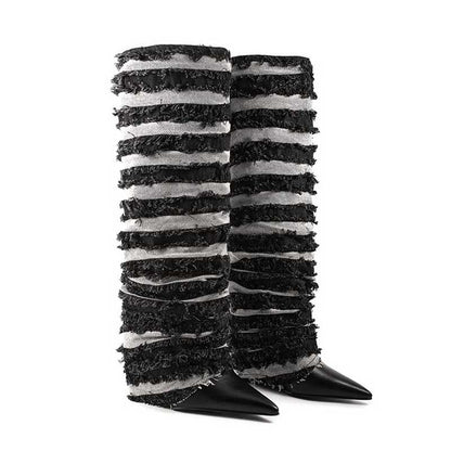 Stylish women's statement denim boots with a unique striped design and pointed toes for fashionable outfits