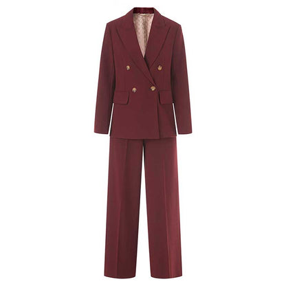 Stylish women's straight-leg pants suit in burgundy with a double-breasted blazer and wide-leg pants