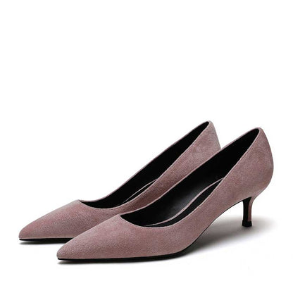 Elegant women's suede party heels in soft pink with a pointed toe and slim heel for chic occasions