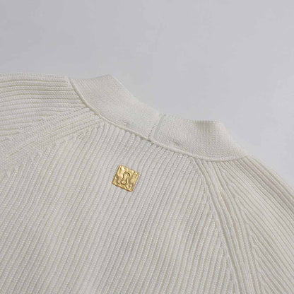 Women's v neck knitted cardigan by sd-hk with a stylish gold logo label on the back