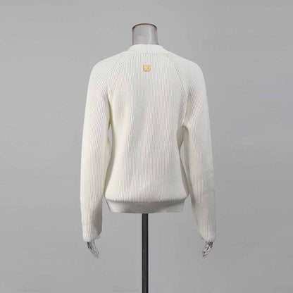 White women's v neck knitted cardigan with ribbed texture and back logo detail